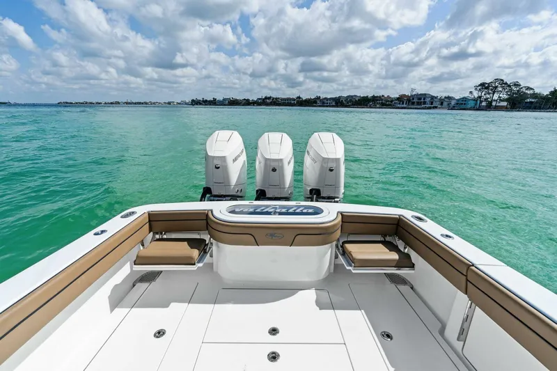 Galati Yacht Sales Trade Yacht Photos Pics 2024 Valhalla Boatworks V-37 on turquoise water, featuring triple outboard engines.