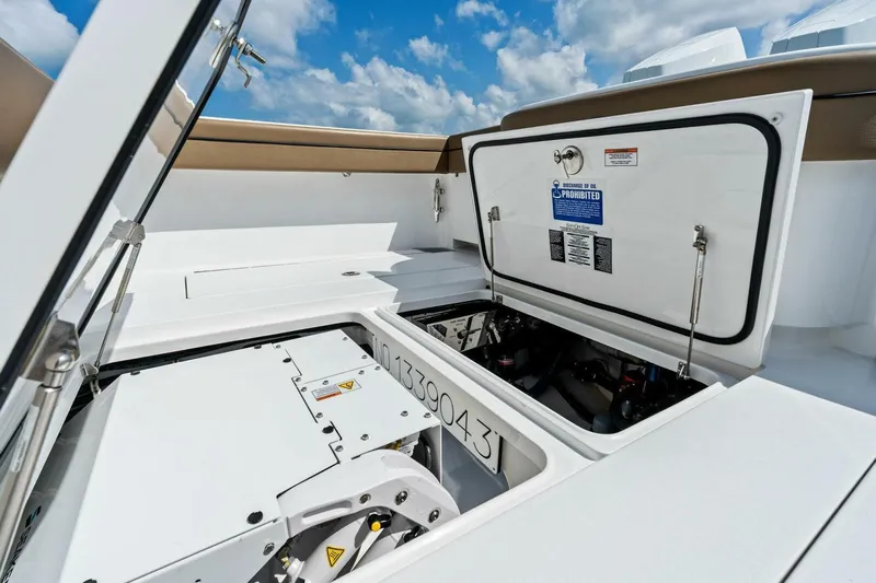 Galati Yacht Sales Trade Yacht Photos Pics 2024 Valhalla Boatworks V-37 engine compartment with open hatch, showcasing mechanical details.