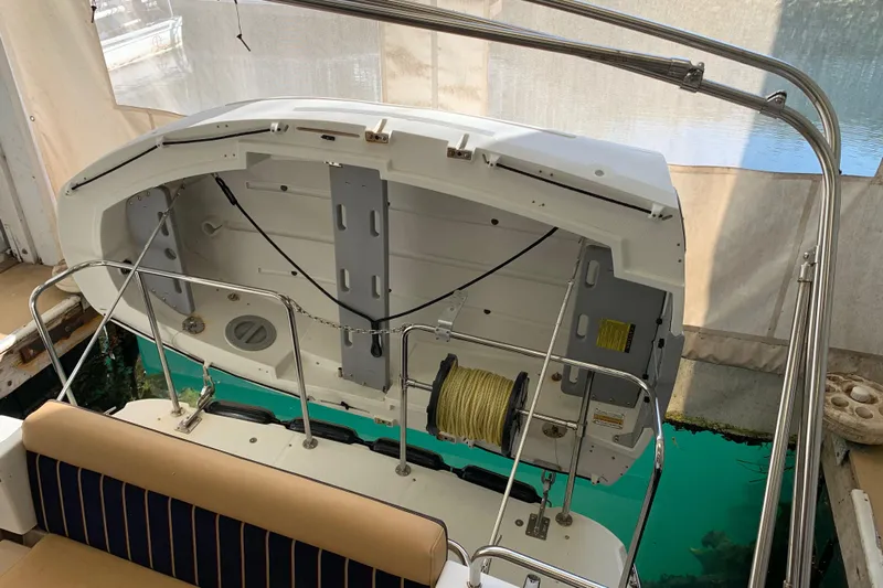 Yacht Photos Pics 2014 Ranger Tugs Trawler boat with open storage compartment and seating area.
