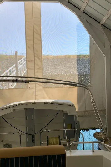  Yacht Photos Pics 2014 Ranger Tugs Trawler docked in a covered marina.