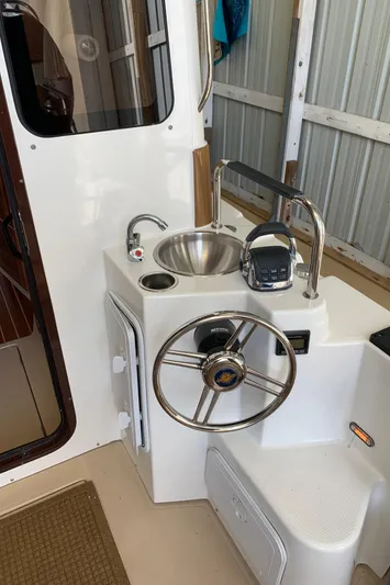  Yacht Photos Pics 2014 Ranger Tugs Trawler helm station with sink and controls.