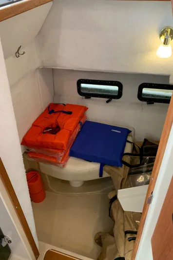  Yacht Photos Pics 2014 Ranger Tugs Trawler cabin with life jackets and storage.