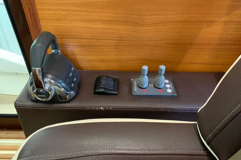  Yacht Photos Pics 2014 Ranger Tugs Trawler control panel with throttle and joystick controls.