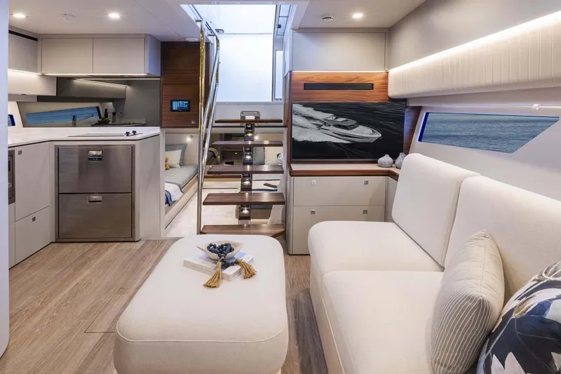  Yacht Photos Pics Manufacturer Provided Image: Luxurious interior of 2026 Riviera 4300 Sport Express yacht with modern furnishings and elegant design.