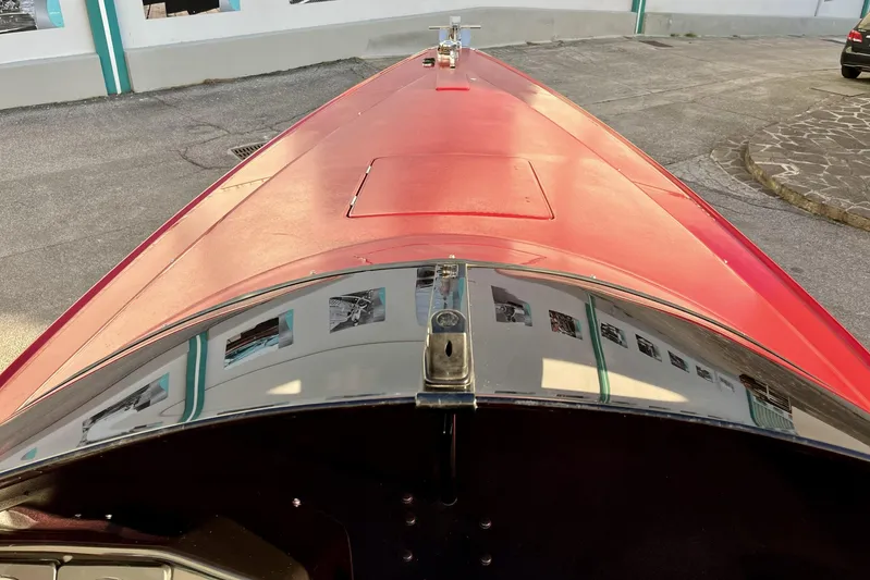  Yacht Photos Pics Red 1994 Riva 32 Ferrari Special boat, top view, parked on concrete surface.