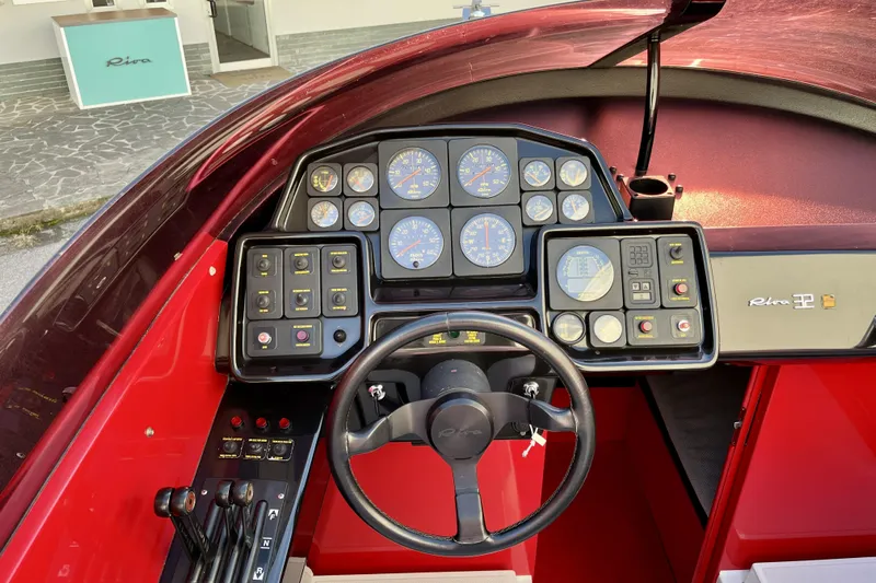  Yacht Photos Pics Dashboard of a 1994 Riva 32 Ferrari Special boat with gauges and controls.