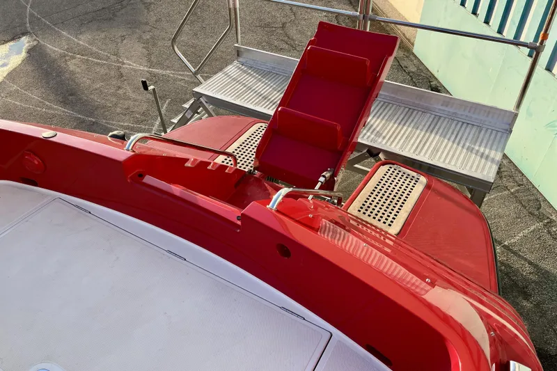  Yacht Photos Pics Red 1994 Riva 32 Ferrari Special boat with sleek design and metallic accents.