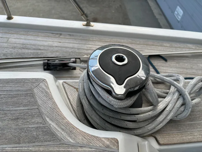 Nemo Yacht Photos Pics Winch and rope on the deck of a 2015 Grand Soleil 47 sailboat.