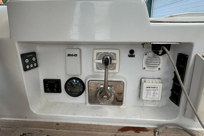 Nemo Yacht Photos Pics Control panel of a 2015 Grand Soleil 47 sailboat with various instruments and switches.
