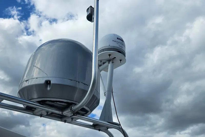 Yacht Photos Pics Radar equipment on 1988 Cheoy Lee 51 Long Range Cockpit Motor Yacht under cloudy sky.