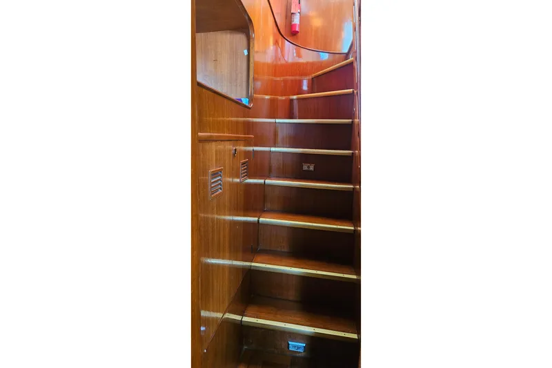  Yacht Photos Pics Wooden staircase inside 1988 Cheoy Lee 51 Long Range Cockpit Motor Yacht.