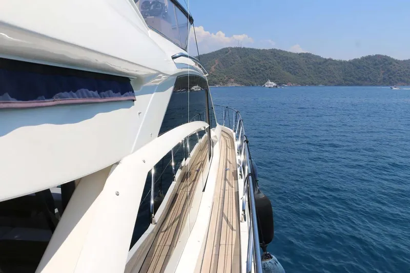  Yacht Photos Pics Luxury yacht Absolute 56 FLY cruising on blue waters, 2015 model.
