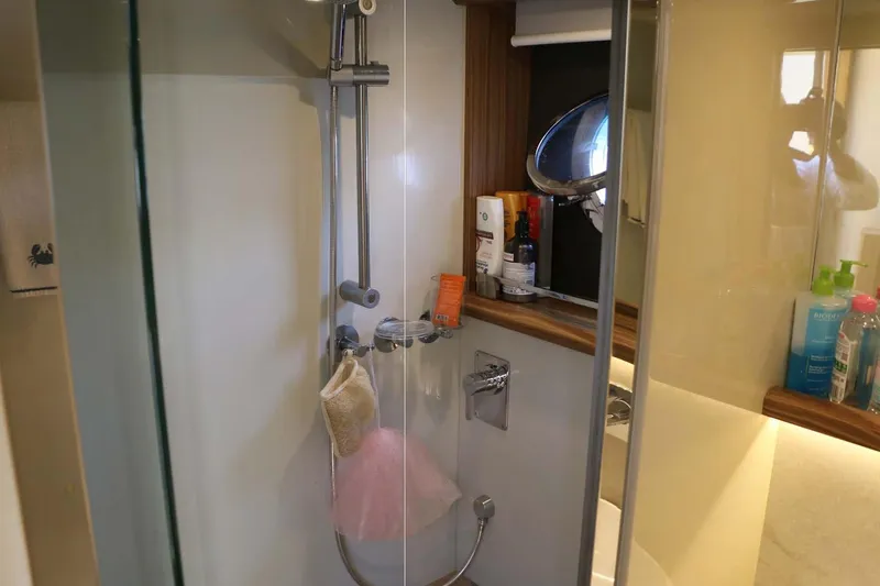  Yacht Photos Pics Bathroom interior of 2015 Absolute 56 FLY yacht with shower and toiletries.
