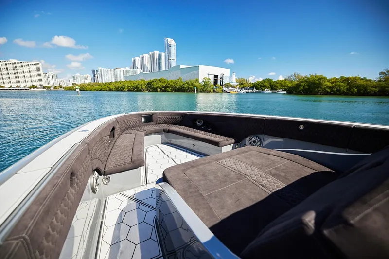  Yacht Photos Pics Luxurious Midnight Express 52' Vitesse boat interior with city skyline and waterfront view.