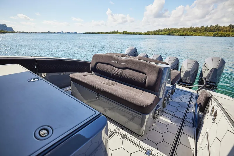  Yacht Photos Pics Luxury Midnight Express 52' Vitesse boat interior with multiple engines on a sunny day.