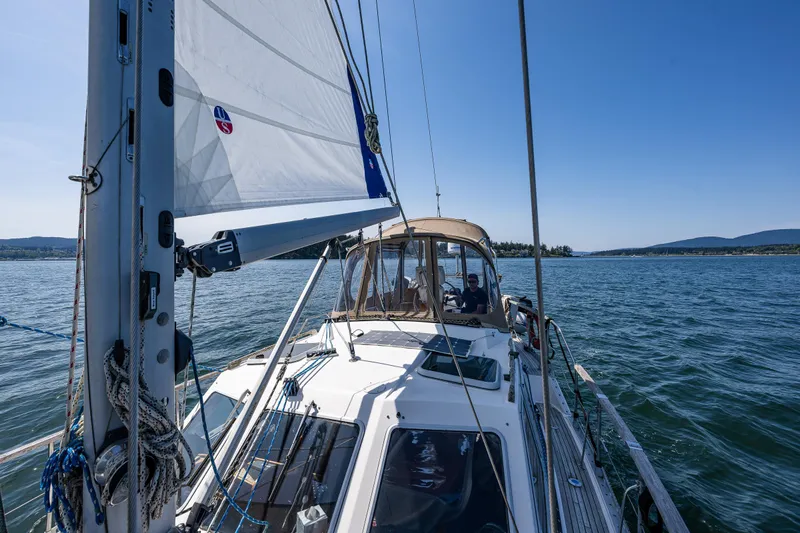 Emeritus Yacht Photos Pics Sailing on a 2000 Nauticat 35 Pilot House yacht in open waters.