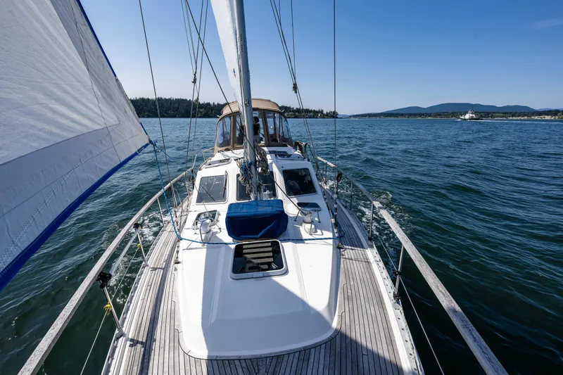 Emeritus Yacht Photos Pics Sailing on a 2000 Nauticat 35 Pilot House yacht in open waters.