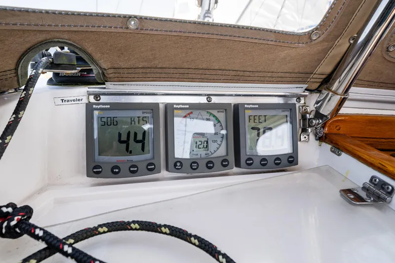 Emeritus Yacht Photos Pics Nauticat 35 Pilot House 2000 boat instruments displaying speed, depth, and navigation data.