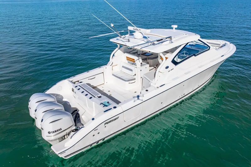 Conspirasea Yacht Photos Pics 2021 Pursuit DC 365 Dual Console boat on clear blue water.