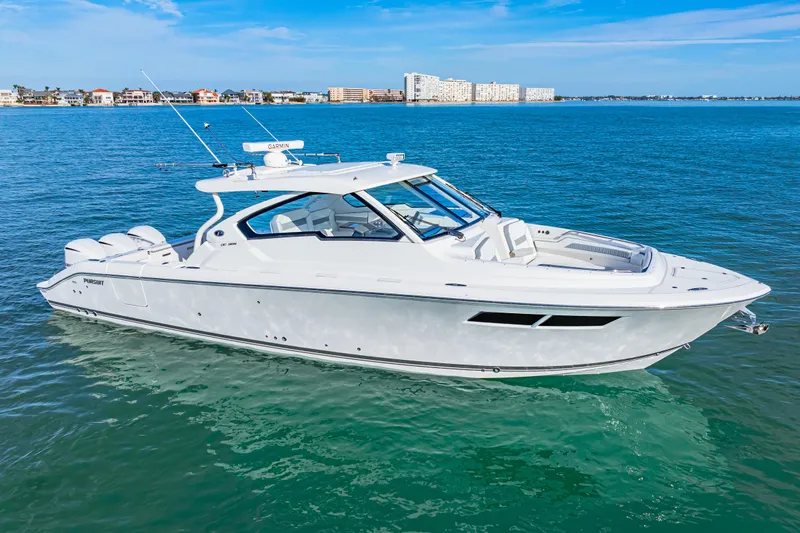 Conspirasea Yacht Photos Pics 2021 Pursuit DC 365 Dual Console boat on clear blue water.