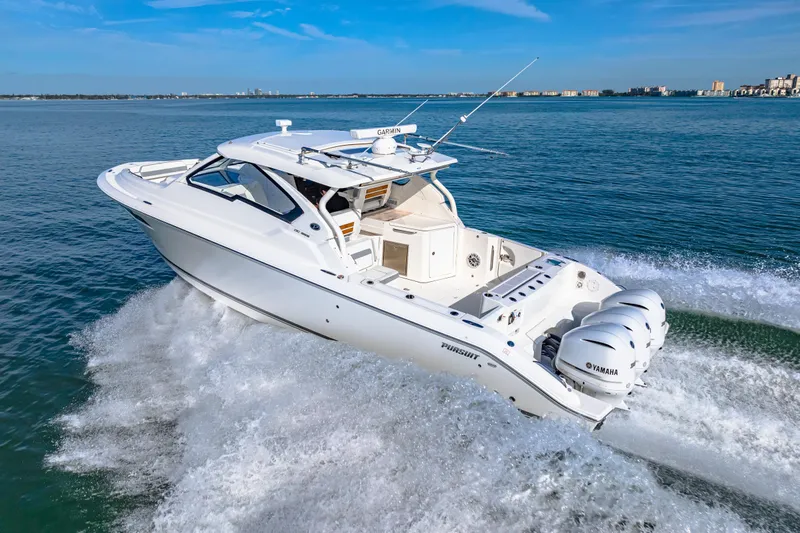 Conspirasea Yacht Photos Pics 2021 Pursuit DC 365 Dual Console boat cruising on open water.