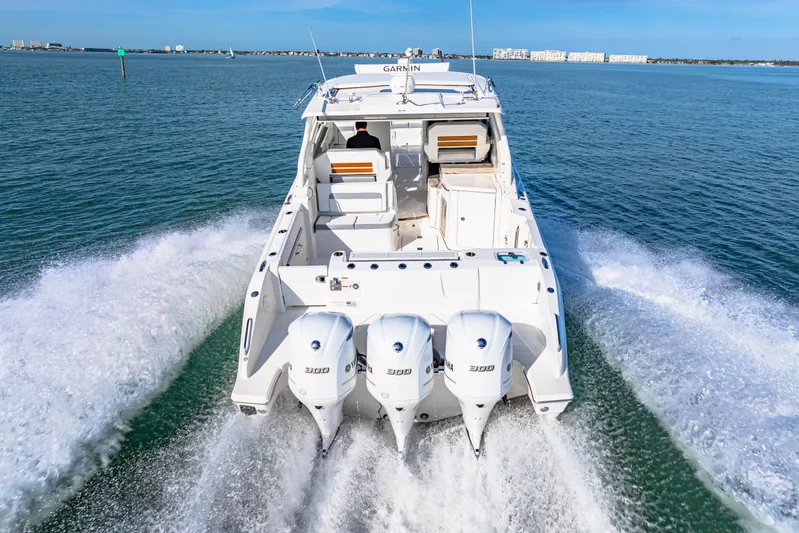 Conspirasea Yacht Photos Pics 2021 Pursuit DC 365 Dual Console boat cruising on open water.