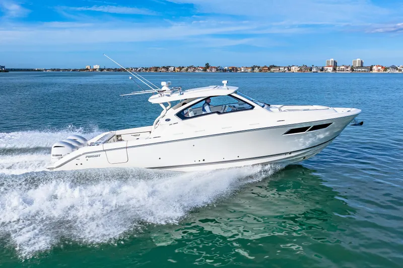 Conspirasea Yacht Photos Pics 2021 Pursuit DC 365 Dual Console boat cruising on open water.