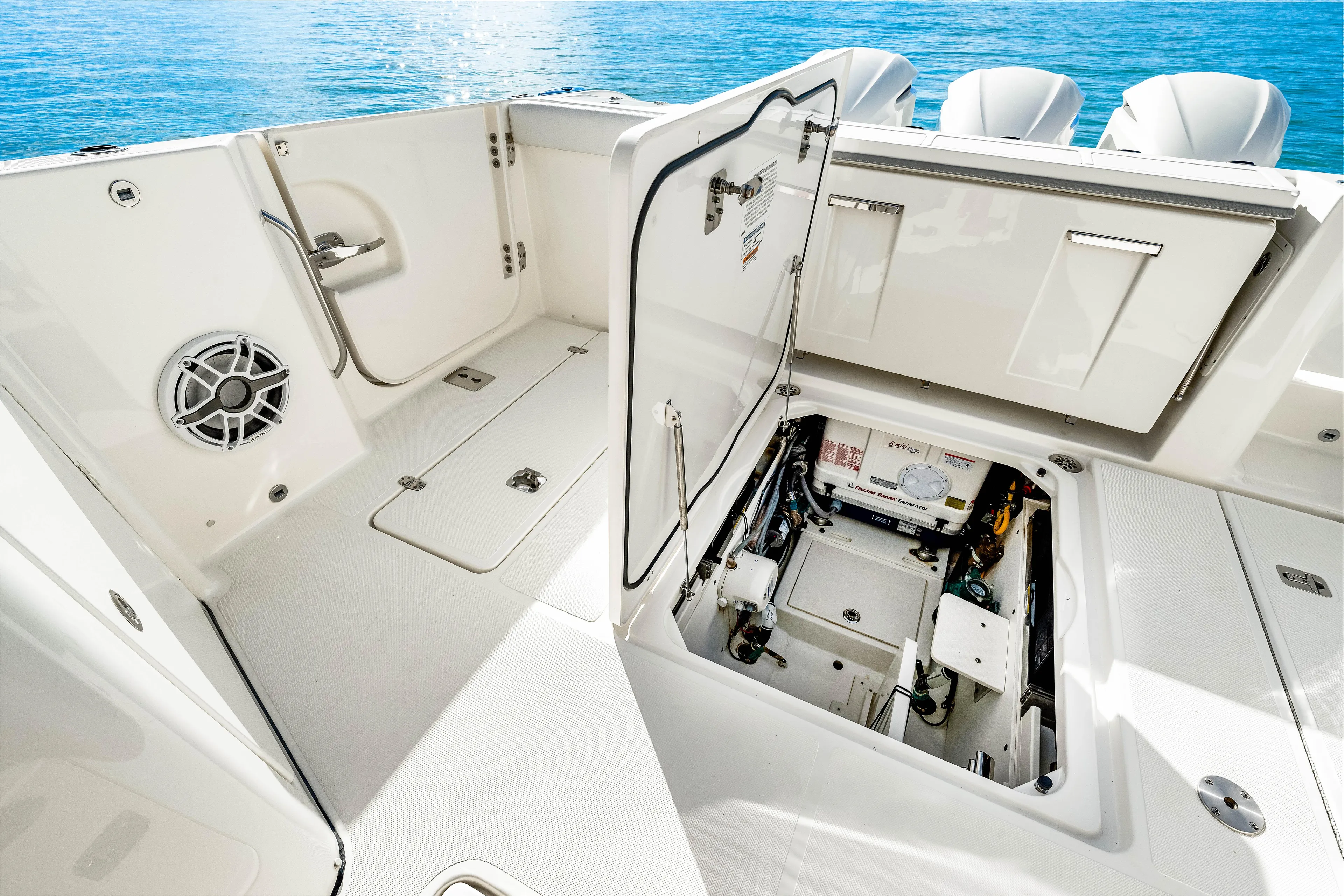 Conspirasea Yacht Photos Pics 2021 Pursuit DC 365 Dual Console boat interior with open storage compartment.