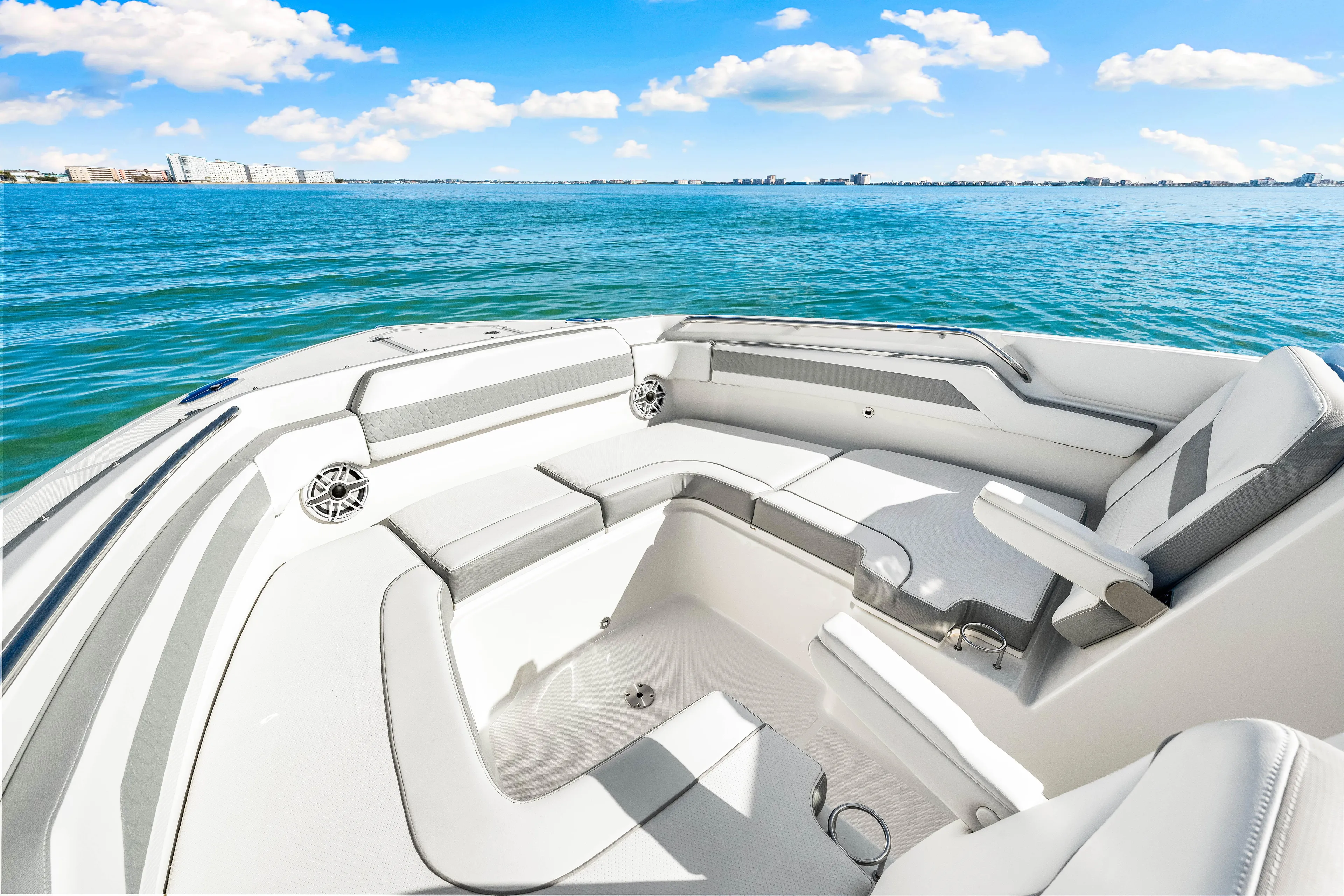 Conspirasea Yacht Photos Pics 2021 Pursuit DC 365 Dual Console boat interior with ocean view, featuring spacious seating.