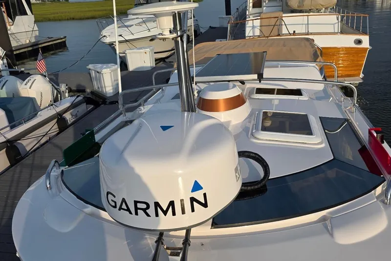  Yacht Photos Pics 2023 Ranger Tugs R-27 boat with Garmin equipment docked at marina.