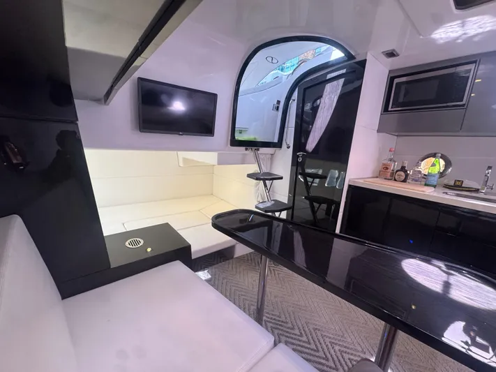  Yacht Photos Pics Luxurious interior of 2023 Schaefer 375 HT yacht with modern amenities and sleek design.