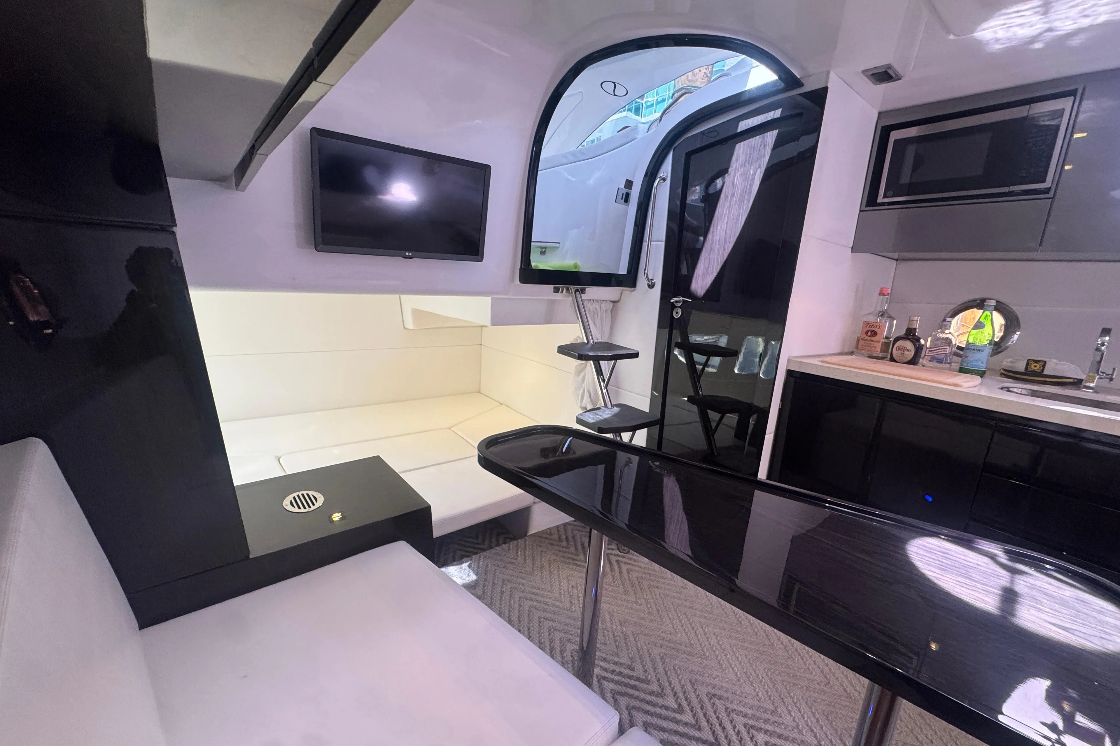 Luxurious interior of 2023 Schaefer 375 HT yacht with modern amenities and sleek design.