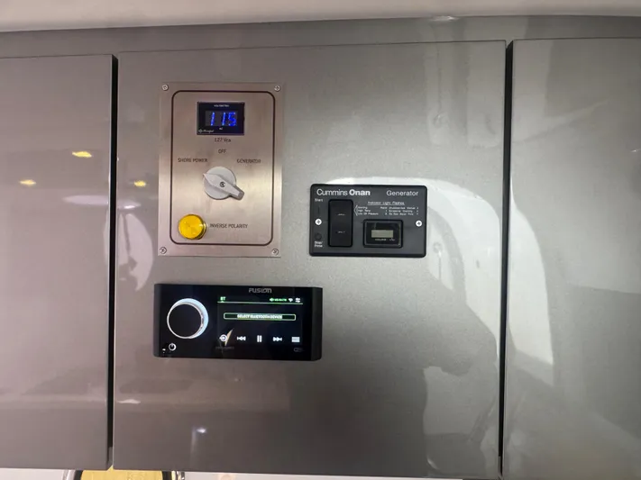  Yacht Photos Pics Control panel of 2023 Schaefer 375 HT boat with generator and audio system.