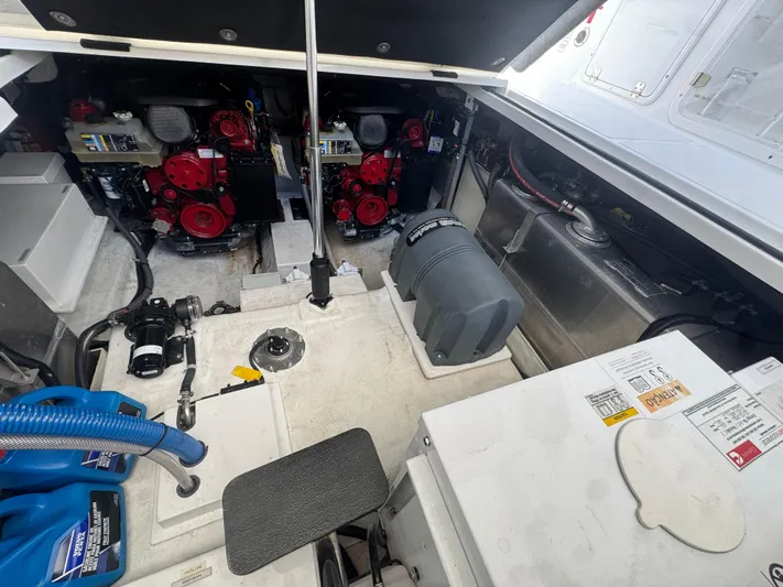  Yacht Photos Pics Engine compartment of 2023 Schaefer 375 HT boat, showcasing dual engines and mechanical components.