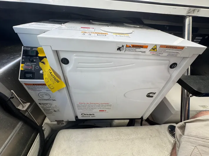  Yacht Photos Pics Onan marine generator inside a 2023 Schaefer 375 HT boat.