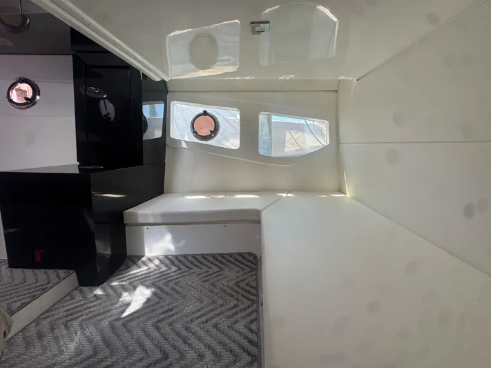  Yacht Photos Pics Interior of 2023 Schaefer 375 HT yacht with modern design and porthole windows.