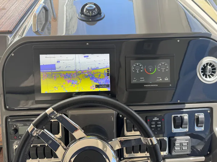  Yacht Photos Pics 2023 Schaefer 375 HT dashboard with navigation and control screens.