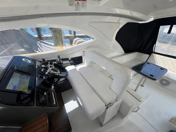  Yacht Photos Pics Interior of 2023 Schaefer 375 HT yacht with modern helm and seating area.