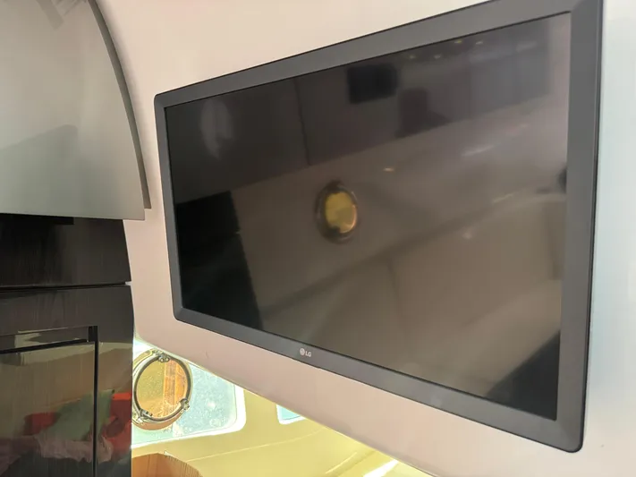  Yacht Photos Pics Interior of 2023 Schaefer 375 HT yacht featuring a mounted flat-screen TV.