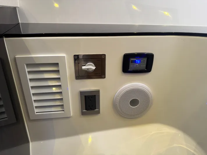  Yacht Photos Pics Control panel and speaker on 2023 Schaefer 375 HT boat interior.