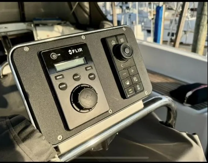 Padraigin II Yacht Photos Pics Control panel on 2016 Jeanneau Yachts 58, featuring FLIR system and joystick.