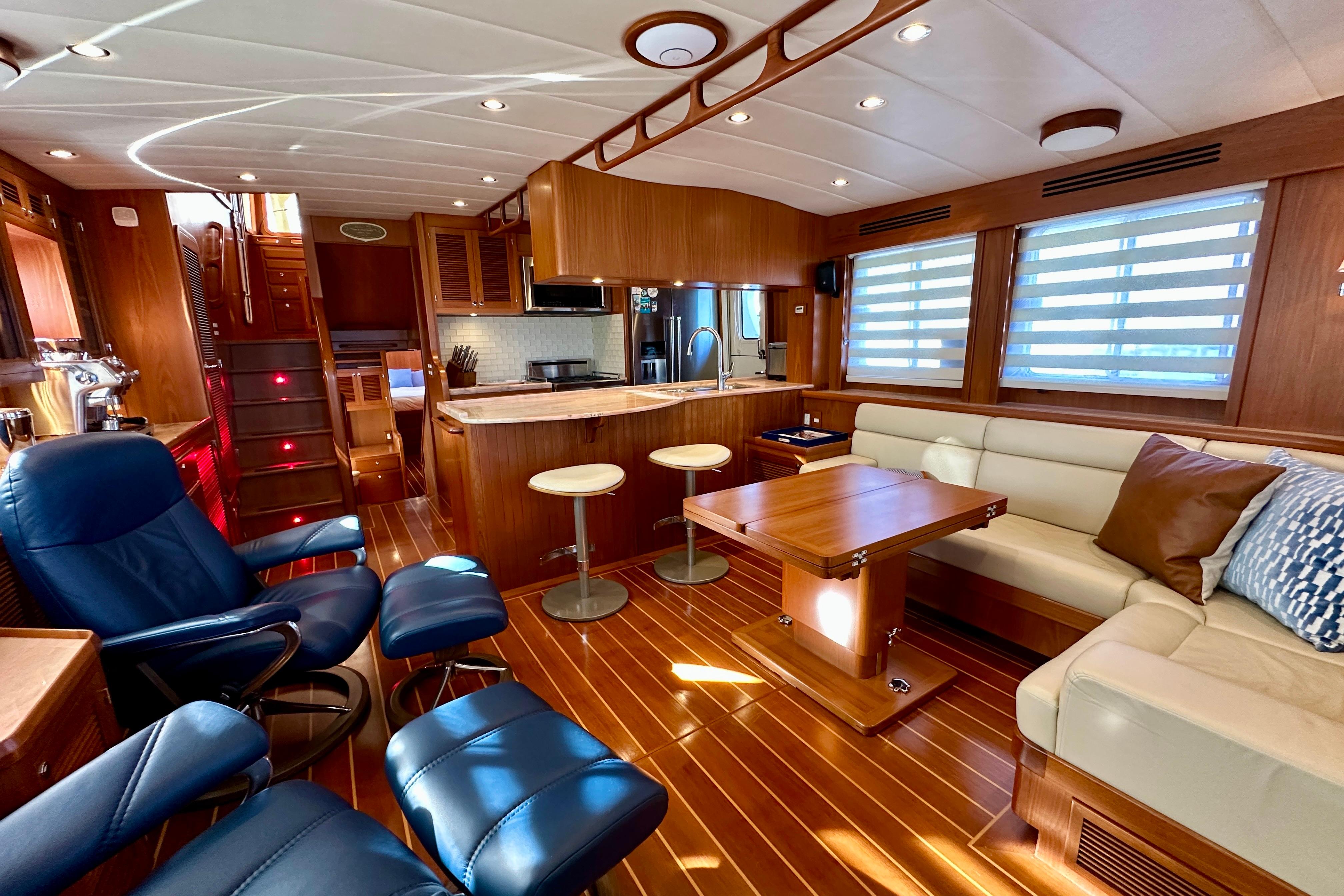 Luxurious 2017 Kadey-Krogen 58EB yacht interior with elegant wood finishes and modern furnishings.