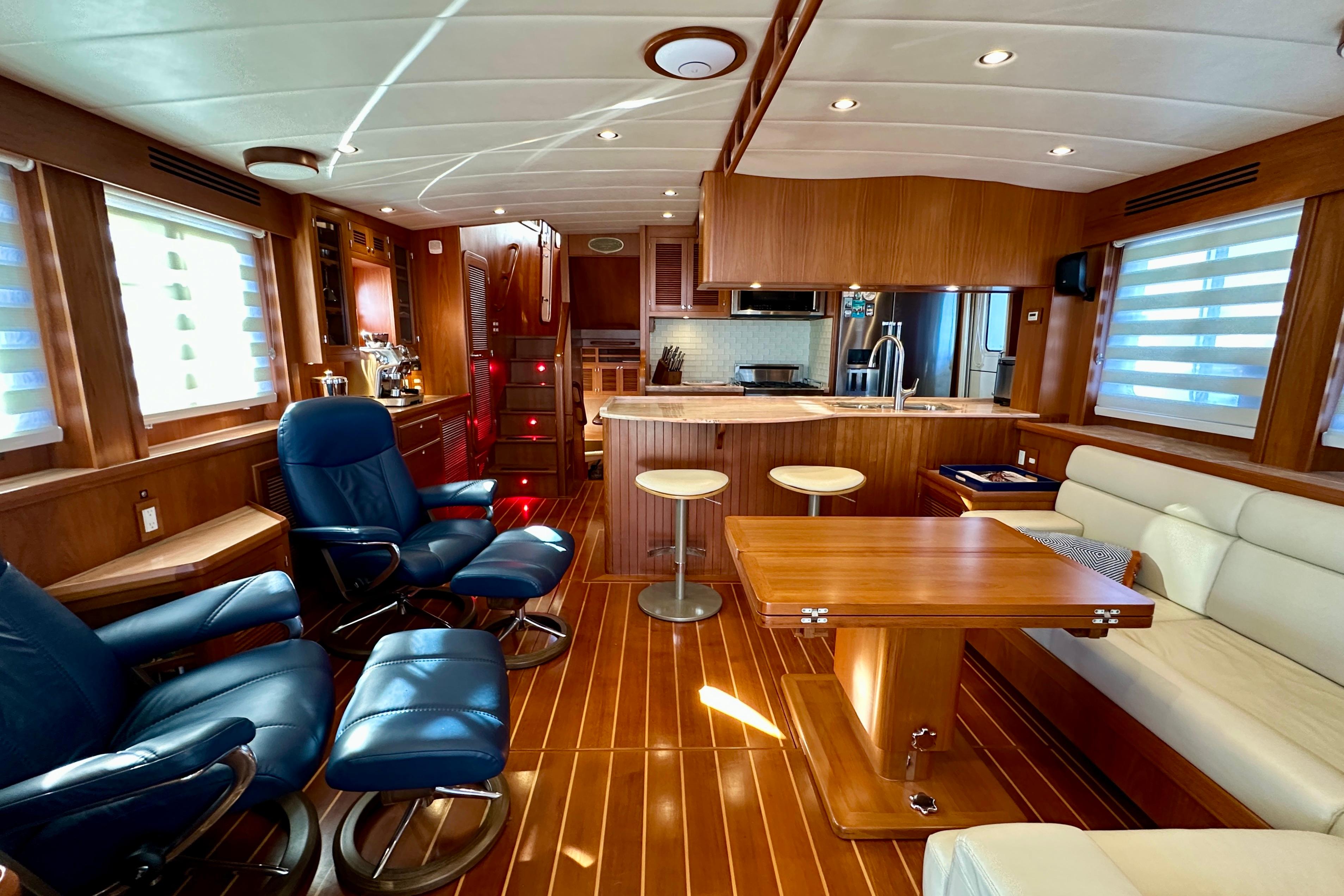 Luxurious interior of 2017 Kadey-Krogen 58EB yacht with elegant wood finishes.