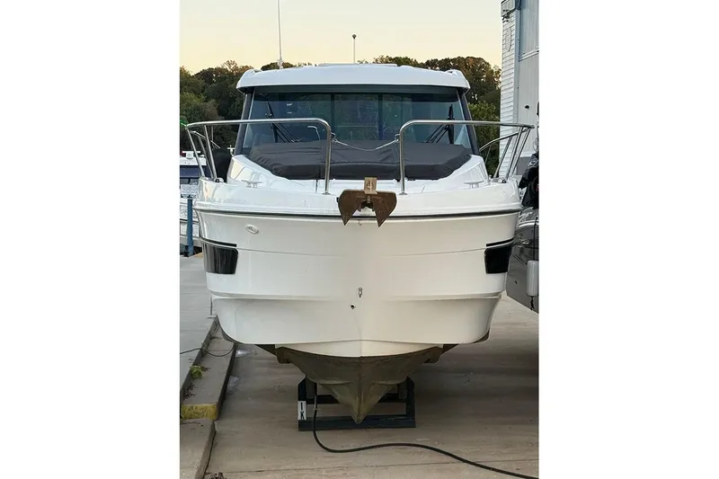  Yacht Photos Pics 2023 Beneteau Antares 9 boat on dry dock, front view.