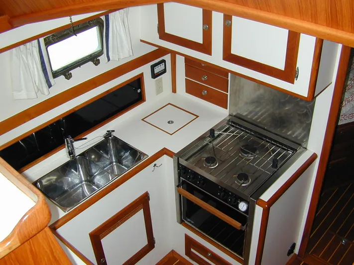 Coaster Yacht Photos Pics Portside U-Shaped Galley
