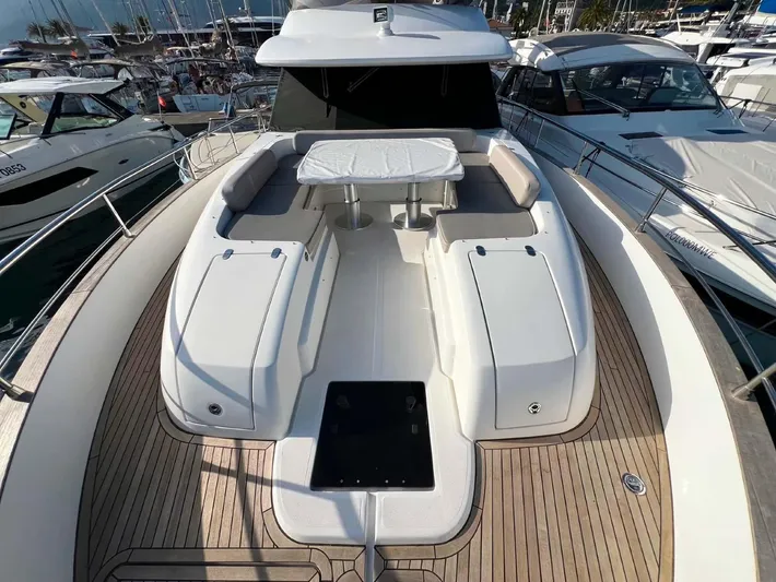 Obsession Yacht Photos Pics Azimut Magellano 53 yacht deck, 2015 model, featuring spacious seating and elegant design.