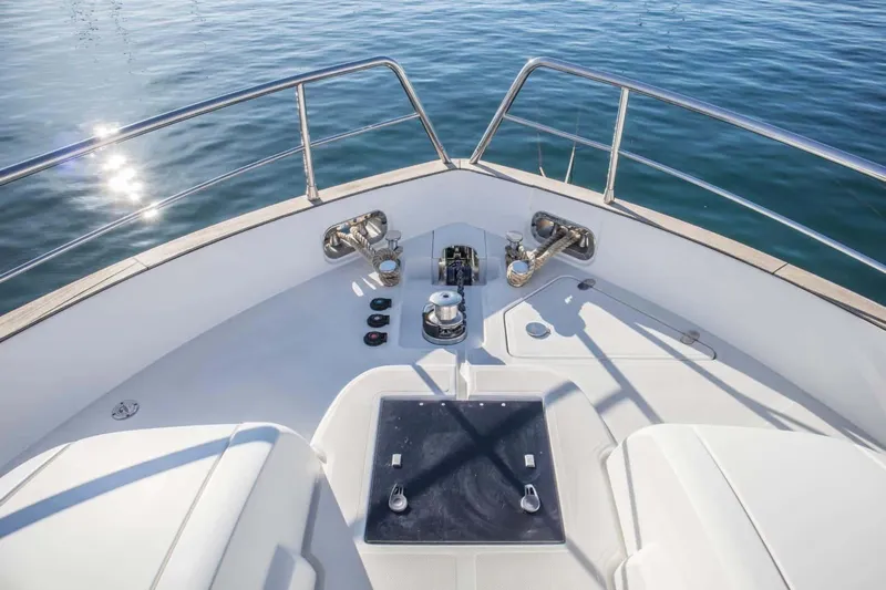 Obsession Yacht Photos Pics Bow of 2015 Azimut Magellano 53 yacht with stainless steel railings.