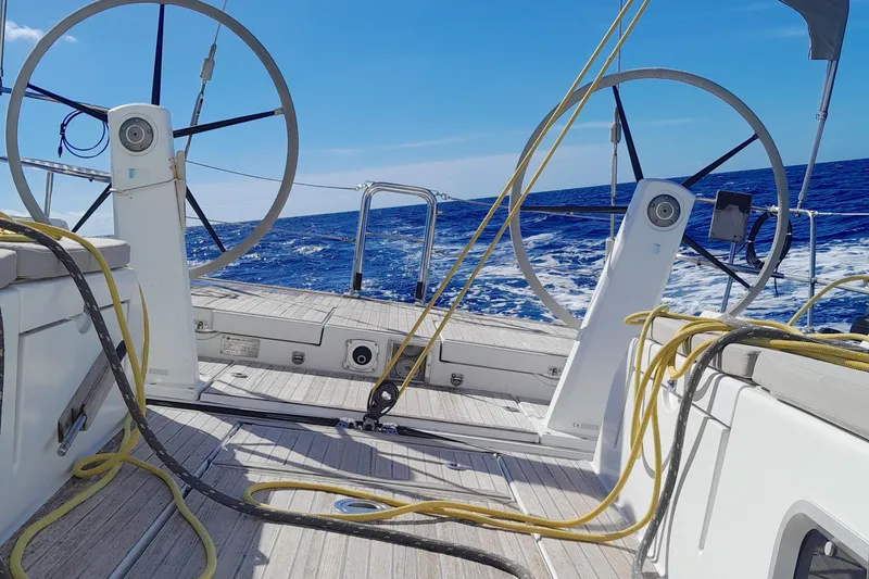  Yacht Photos Pics Grand Soleil 54 sailboat deck, 2010 model, with dual steering wheels and ocean view.