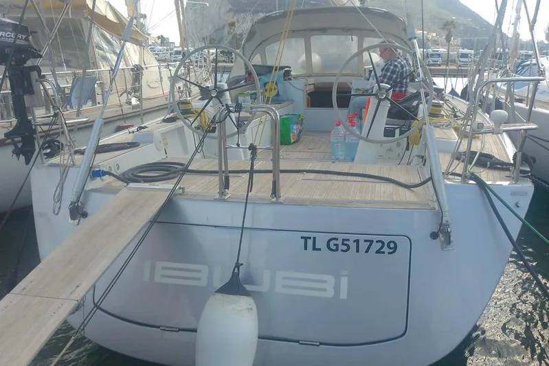  Yacht Photos Pics Sailing yacht Grand Soleil 54, 2010 model, docked at marina with visible steering wheels.