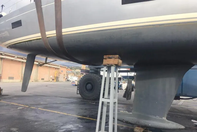  Yacht Photos Pics Grand Soleil 54 yacht from 2010 on dry dock, supported by stands.